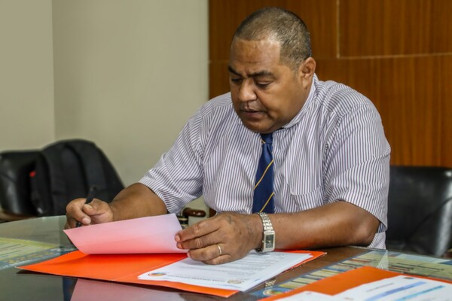 School principal at desk